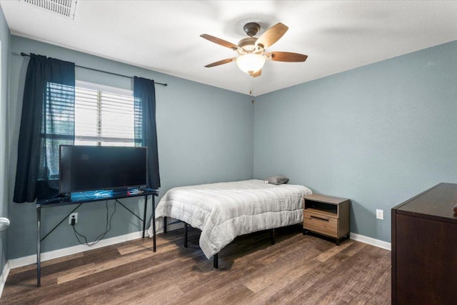2313 Jake Pickle Pass, Leander, TX 78641 - bedroom featuring wood finished floors and ceiling fan