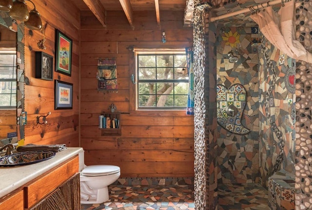 0000 Oakwood Loop, San Marcos, TX 78666 - full bath with wood ceiling with exposed beams, toilet, vanity, wood walls, and a shower with shower curtain