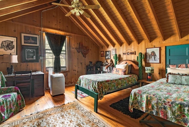 0000 Oakwood Loop, San Marcos, TX 78666 - bedroom with light wood-type flooring, wood ceiling, and wood walls