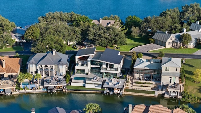 204 Wennmohs Pl, Horseshoe Bay, TX 78657 - aerial perspective of suburban area featuring a large body of water