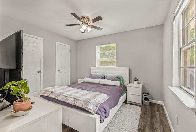 1302 Phyllis Dr, Copperas Cove, TX 76522 - bedroom featuring baseboards, dark wood-type flooring, and ceiling fan