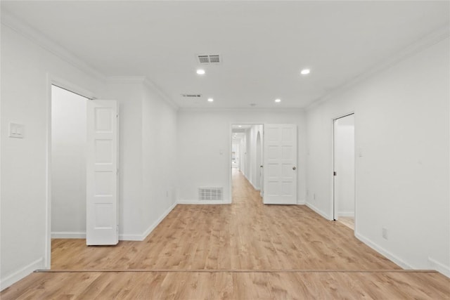 4202 N Hills Dr, Austin, TX 78731 - spare room with crown molding, light wood finished floors, and recessed lighting