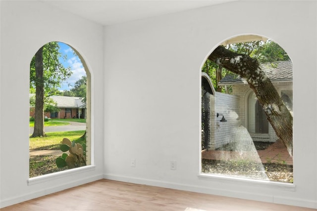 4202 N Hills Dr, Austin, TX 78731 - empty room with wood finished floors and baseboards