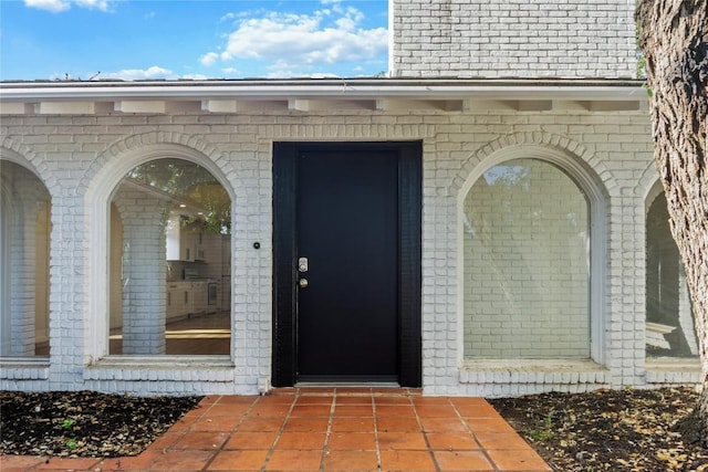 4202 N Hills Dr, Austin, TX 78731 - doorway to property with brick siding