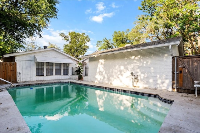 4202 N Hills Dr, Austin, TX 78731 - view of swimming pool with a patio and a gate