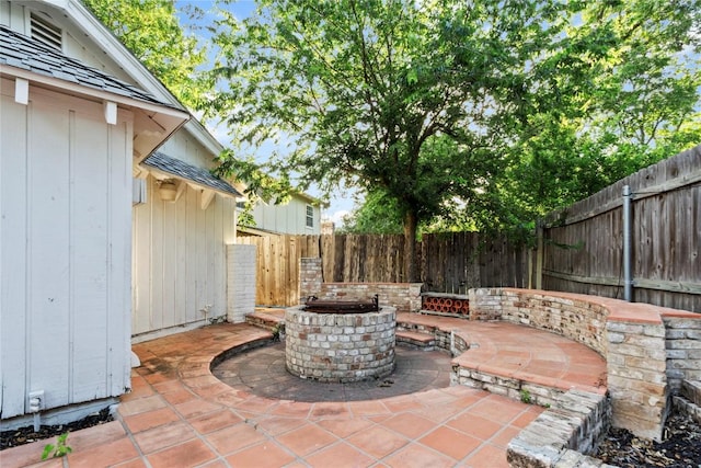4202 N Hills Dr, Austin, TX 78731 - fenced backyard with a patio area and a fire pit