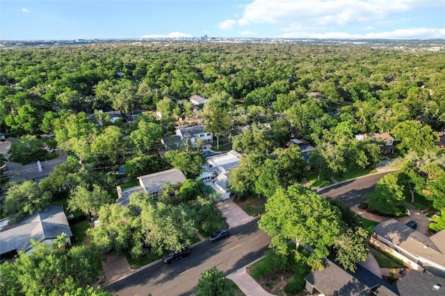 4202 N Hills Dr, Austin, TX 78731 - aerial view of property and surrounding area with a heavily wooded area