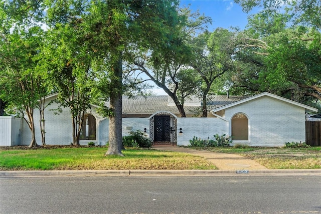 4202 N Hills Dr, Austin, TX 78731 - view of front of property featuring brick siding