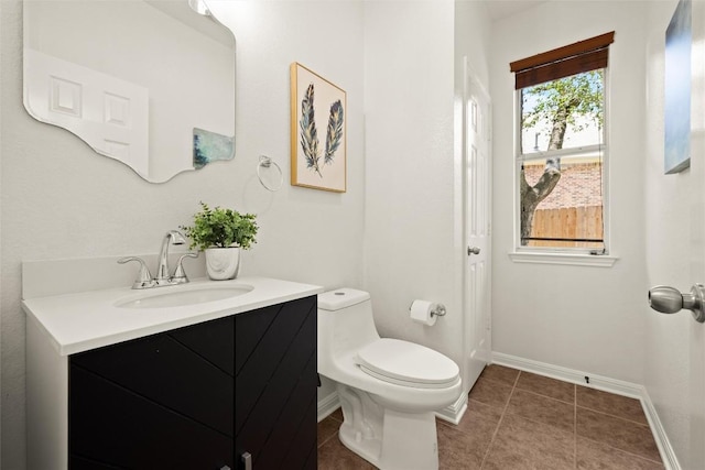220 Grafton Ln, Austin, TX 78737 - bathroom with vanity, baseboards, toilet, and tile patterned floors