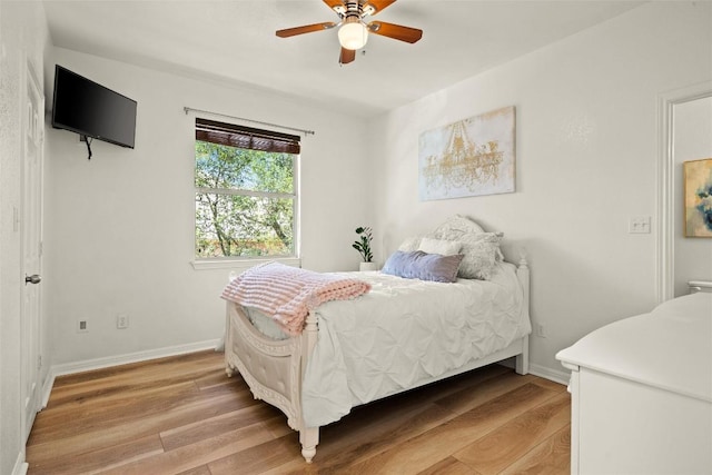 220 Grafton Ln, Austin, TX 78737 - bedroom featuring light wood-style flooring, baseboards, and ceiling fan