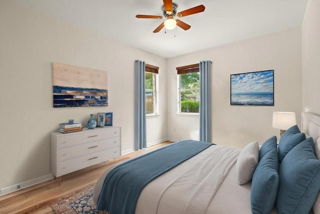 220 Grafton Ln, Austin, TX 78737 - bedroom featuring baseboards, light wood-style floors, and ceiling fan