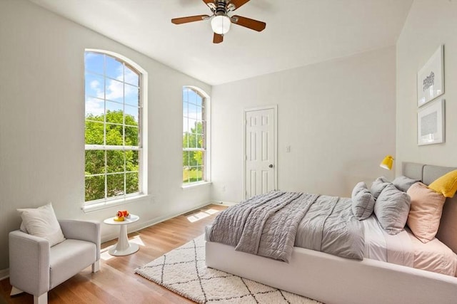 220 Grafton Ln, Austin, TX 78737 - bedroom featuring wood finished floors, baseboards, and a ceiling fan