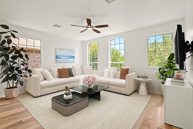 220 Grafton Ln, Austin, TX 78737 - living area with plenty of natural light and light wood-style floors