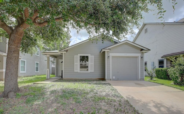 77 Jan Ln, Georgetown, TX 78626 - view of front of home with an attached garage and driveway