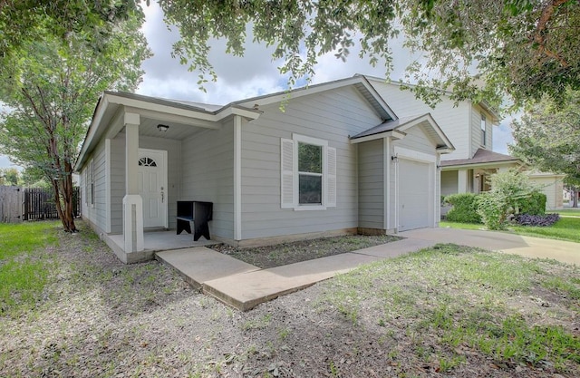 77 Jan Ln, Georgetown, TX 78626 - ranch-style house with a garage and concrete driveway