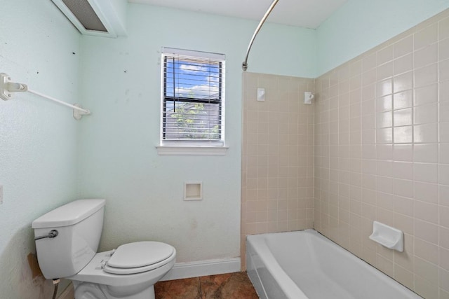702 Westminster Pl, Round Rock, TX 78664 - full bathroom with toilet, tile patterned flooring, shower / washtub combination, and baseboards