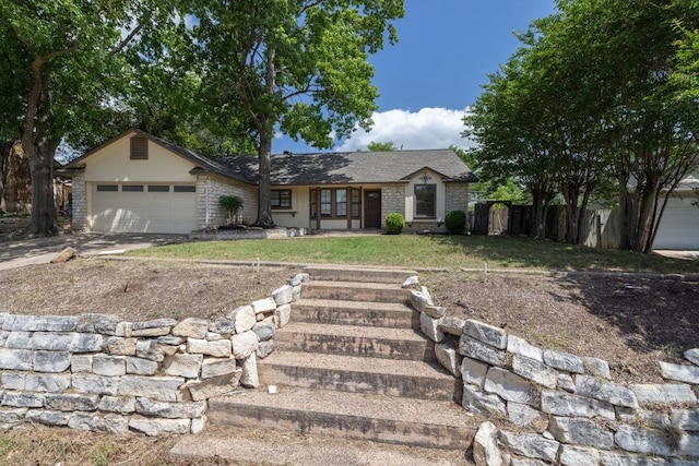 702 Westminster Pl, Round Rock, TX 78664 - ranch-style home featuring an attached garage and driveway
