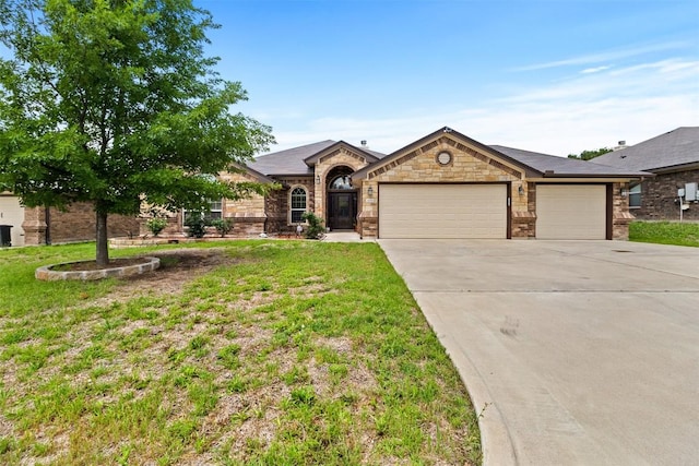 2034 Falling Leaf Ln, Harker Heights, TX 76548 - view of front of home with concrete driveway, an attached garage, and a front yard