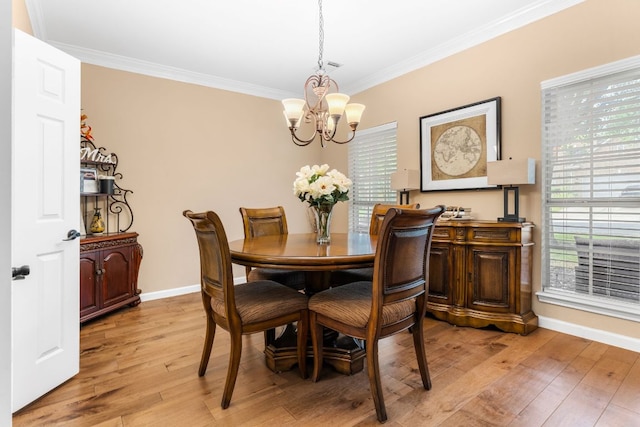 15150 Galena Dr, Austin, TX 78717 - dining room with a chandelier, ornamental molding, light wood finished floors, and plenty of natural light