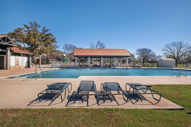 15150 Galena Dr, Austin, TX 78717 - community pool featuring a gazebo, a patio, and an outbuilding