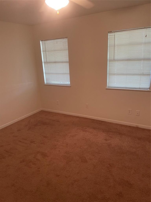 207 N 1st St, Thorndale, TX 76577 - unfurnished room featuring healthy amount of natural light and carpet