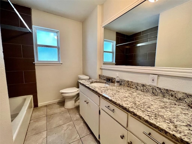 3500 Loyola Ln, Austin, TX 78723 - full bath featuring vanity, toilet, tile patterned floors, baseboards, and tub / shower combination