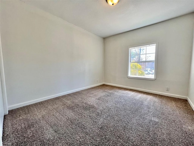 3500 Loyola Ln, Austin, TX 78723 - carpeted empty room with baseboards