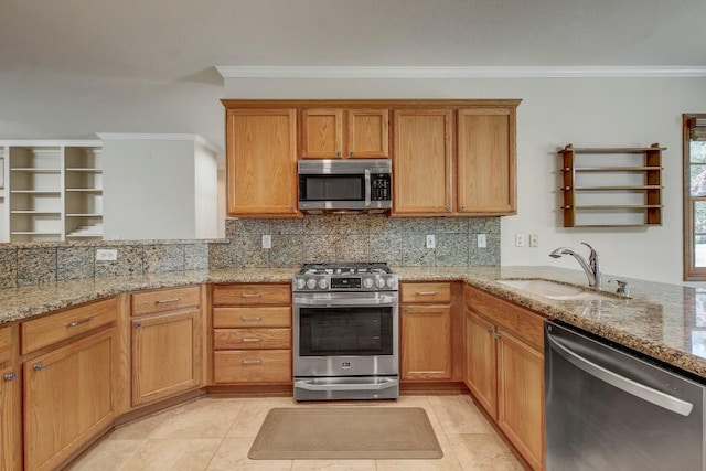 401 Texas Dr, Georgetown, TX 78633 - kitchen with stainless steel appliances, crown molding, decorative backsplash, light stone counters, and light tile patterned flooring