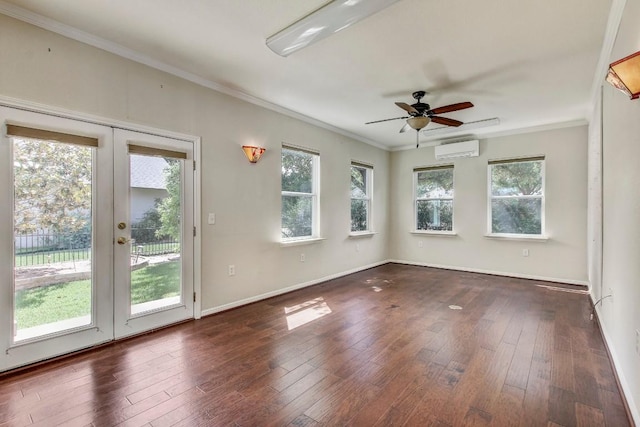 401 Texas Dr, Georgetown, TX 78633 - unfurnished room featuring an AC wall unit, french doors, ornamental molding, hardwood / wood-style flooring, and ceiling fan