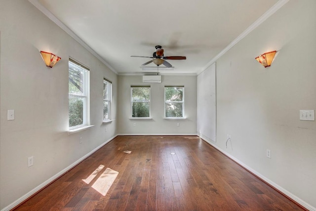 401 Texas Dr, Georgetown, TX 78633 - unfurnished room featuring a wall mounted AC, a ceiling fan, crown molding, hardwood / wood-style flooring, and baseboards