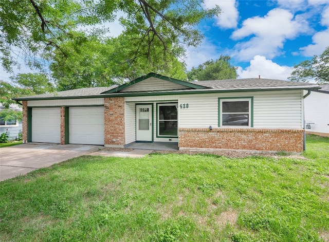 410 Blueberry Hl, Austin, TX 78745 - single story home with brick siding, driveway, a front yard, and an attached garage