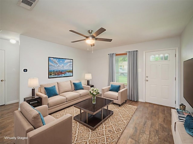 410 Blueberry Hl, Austin, TX 78745 - living room with wood finished floors and ceiling fan