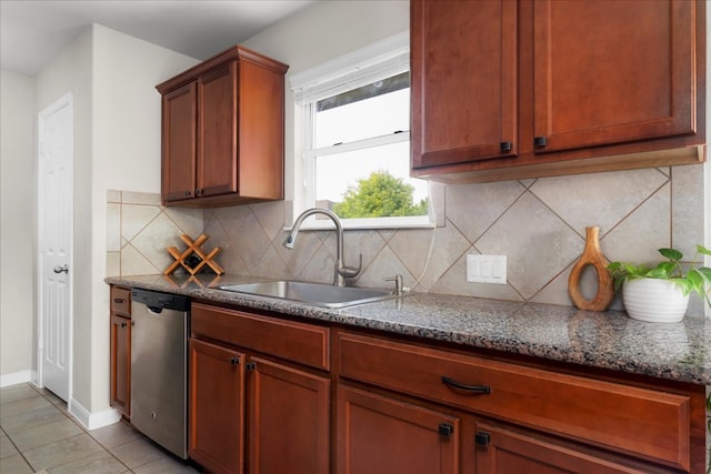 228 Wallops, Kyle, TX 78640 - kitchen featuring stainless steel dishwasher, tasteful backsplash, light tile patterned floors, and brown cabinets
