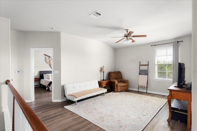228 Wallops, Kyle, TX 78640 - sitting room featuring wood finished floors, a ceiling fan, and baseboards