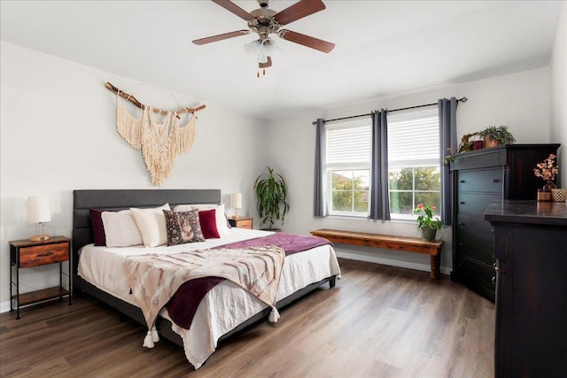 228 Wallops, Kyle, TX 78640 - bedroom with wood finished floors, ceiling fan, and baseboards