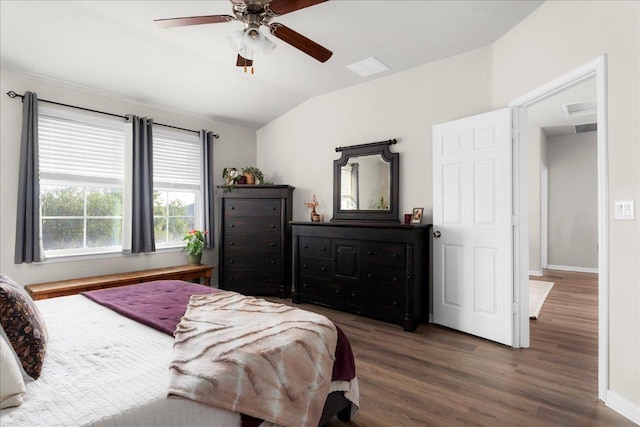 228 Wallops, Kyle, TX 78640 - bedroom featuring vaulted ceiling, wood finished floors, and a ceiling fan
