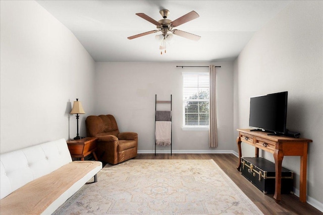 228 Wallops, Kyle, TX 78640 - sitting room featuring wood finished floors, a ceiling fan, and baseboards
