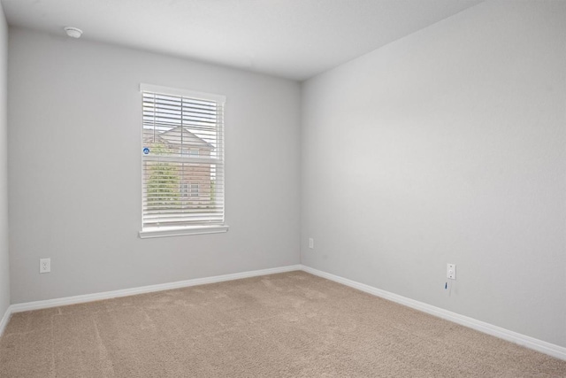 19825 Abigail Fillmore Rd, Manor, TX 78653 - empty room with light colored carpet and a smoke detector