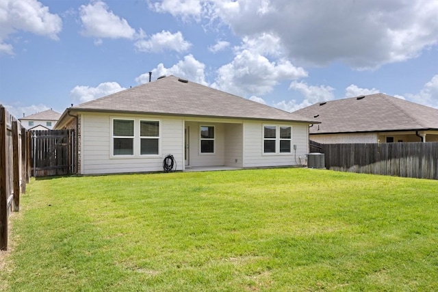 19825 Abigail Fillmore Rd, Manor, TX 78653 - rear view of property featuring a fenced backyard and a patio area