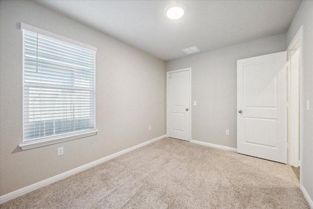 329 Empress Tree Dr, Leander, TX 78641 - unfurnished bedroom featuring carpet and baseboards