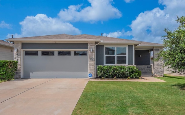4701 Tully Dr, Pflugerville, TX 78660 - view of front of home featuring stone siding, a garage, concrete driveway, a front lawn, and a shingled roof