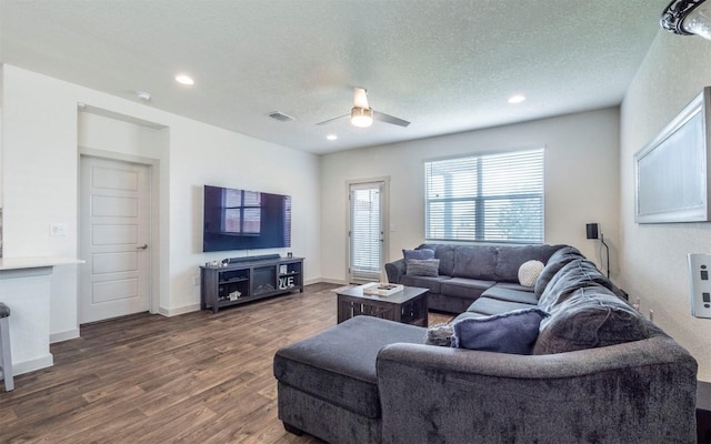 4701 Tully Dr, Pflugerville, TX 78660 - living room with a ceiling fan, wood finished floors, a textured ceiling, recessed lighting, and baseboards