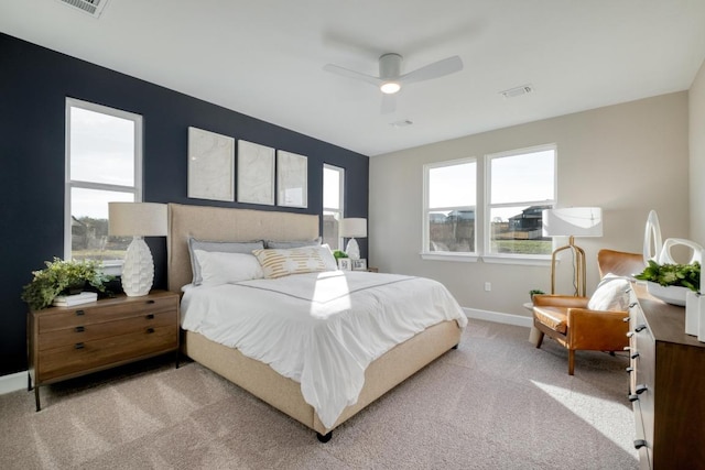 17112 Vernal Rd, Manor, TX 78653 - carpeted bedroom with baseboards and ceiling fan