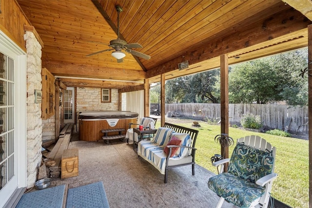 2201 Carolyn Dr, Taylor, TX 76574 - sunroom / solarium with a jacuzzi, a ceiling fan, and lofted ceiling
