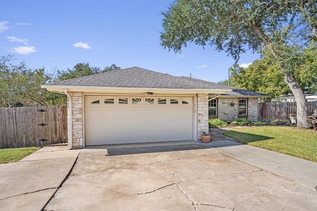 2201 Carolyn Dr, Taylor, TX 76574 - ranch-style home with stone siding, driveway, a shingled roof, and a garage