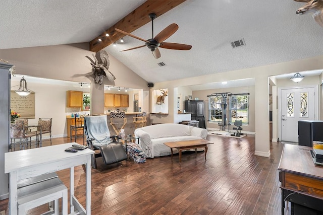 2201 Carolyn Dr, Taylor, TX 76574 - living area featuring ceiling fan, hardwood / wood-style flooring, and a textured ceiling