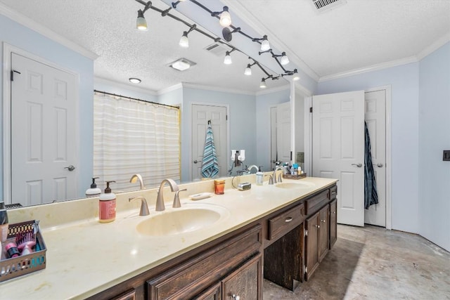 2201 Carolyn Dr, Taylor, TX 76574 - bathroom with double vanity, concrete flooring, and crown molding