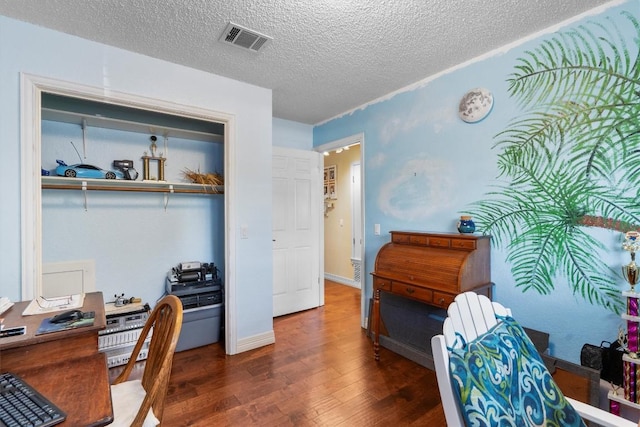 2201 Carolyn Dr, Taylor, TX 76574 - office area with wood finished floors and a textured ceiling