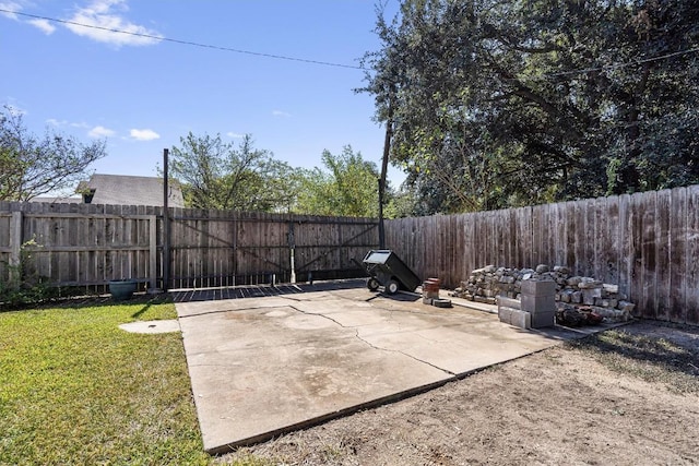 2201 Carolyn Dr, Taylor, TX 76574 - fenced backyard featuring a patio area