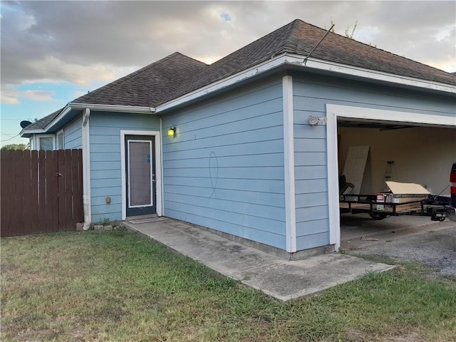 109 E Wheeler St S, Manor, TX 78653 - view of home's exterior with a shingled roof and a garage